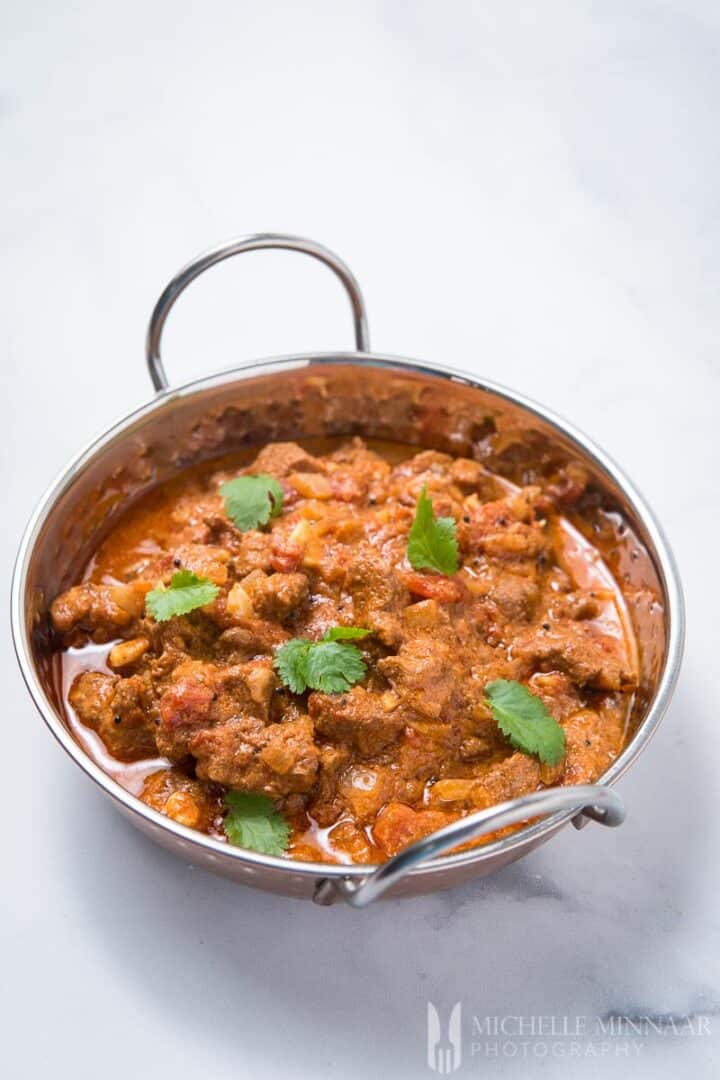 Lamb Madras - Lamb & Tomato Curry Recipe | Greedy Gourmet